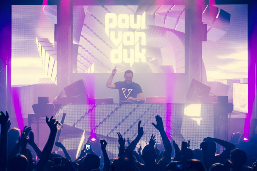 Paul Van Dyk performing live at Electric Brixton, with an electrifying crowd and stunning light effects.