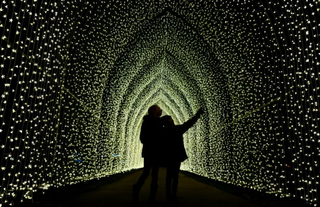 Walking along London's streets enjoying the Christmas lights and festive decorations