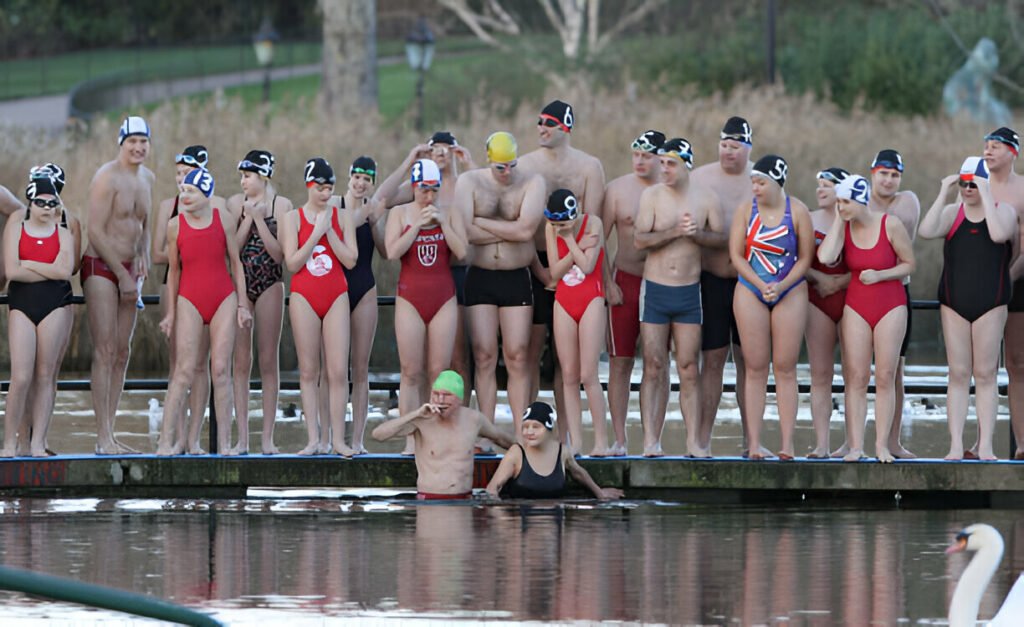 Swimmers participating in the Peter Pan Cup race at Hyde Park’s Serpentine Lake on Christmas morning