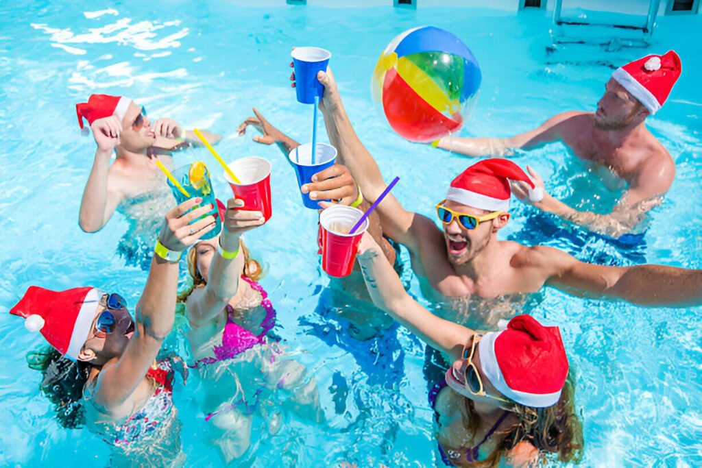 People swimming in the heated Hampton Pool during Christmas