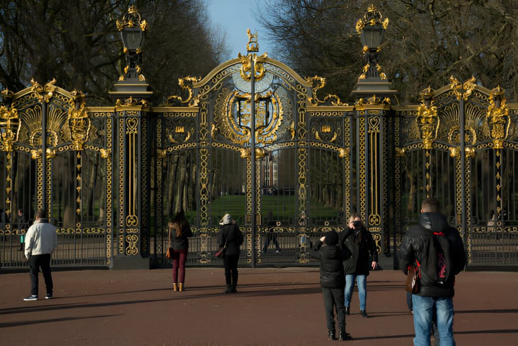 People walking through Green Park in London during the festive season.