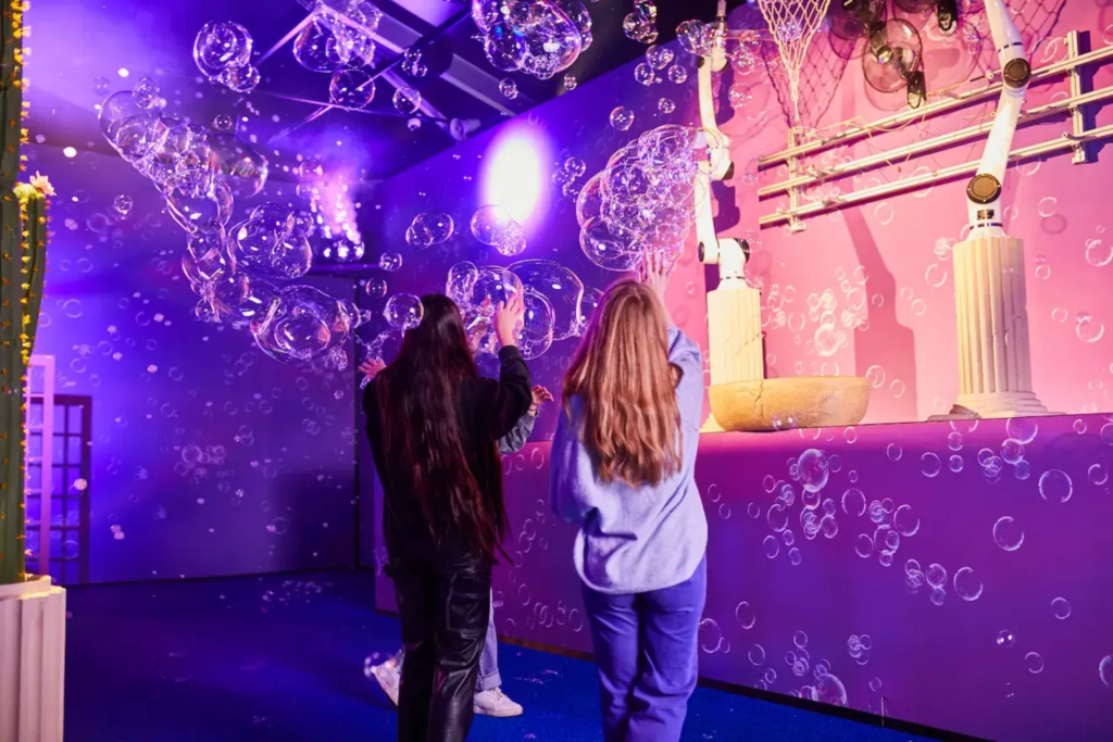 Bubble Getaway at Bubble Planet London with floating bubbles and vibrant colors