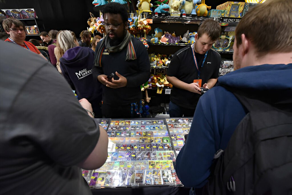 People purchasing Pokémon TCG products, including trading card game packs and collectibles, at Pokémon Center London 2025