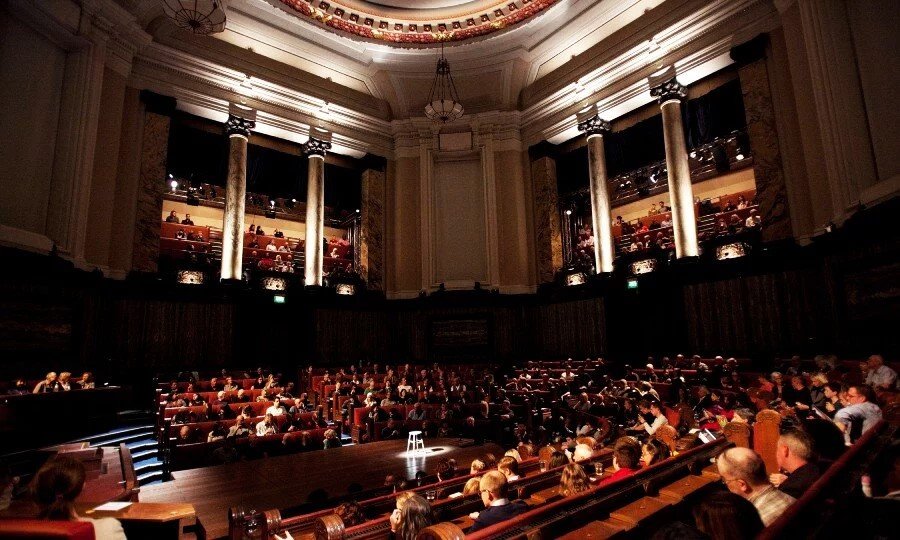 Scene from Witness for the Prosecution show at London County Hall, showcasing the gripping courtroom drama in an iconic venue. Visit HouseToMotive.