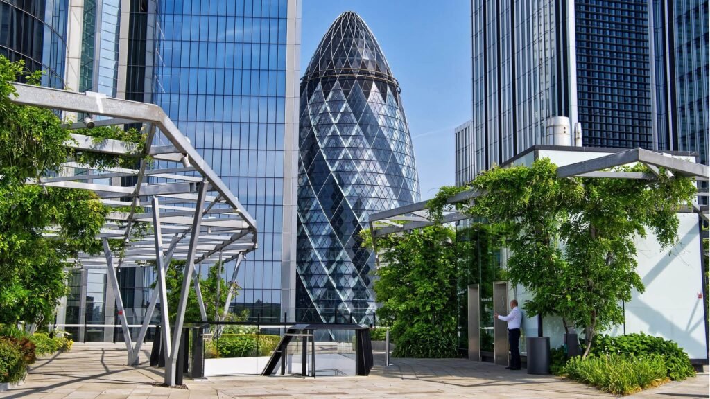 The Garden at 120 rooftop with greenery and London skyline view Lush rooftop garden at The Garden at 120 with a view of London’s skyline. | HouseToMotive | Things to Do in London